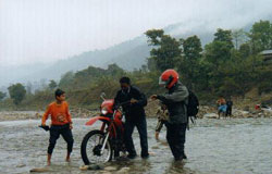 Our mechanic taking out the fallen in the river